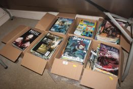Seven boxes of various comic books