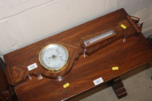 A mahogany cased barometer