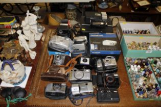 A quantity of various cameras to include Kodak; Fu