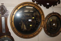 A Regency style gilt framed convex wall mirror