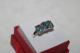 A T.G.G.C. Sterling silver and mosaic opal three s