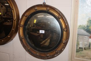 A Regency style gilt framed convex wall mirror
