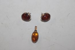 A Sterling silver and amber set ear-rings and pend