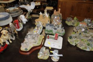 A quantity of various model cottages etc. to inclu