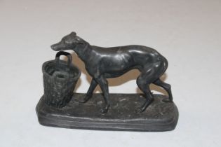 A Spelter greyhound initialled E.R.
