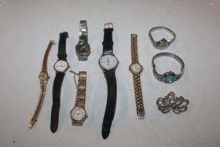 A bag of various wrist watches