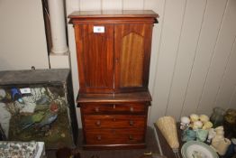 A mahogany apprentice piece linen press