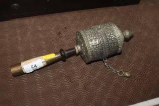 A Tibetan Buddhist prayer wheel