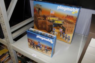 A Playmobil Fort Bravo and a Playmobil cavalry gun