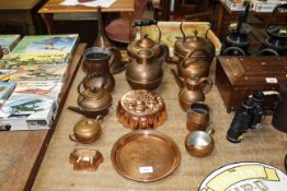 A collection of various copperware to include kett