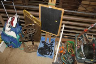 A child's chalk board together with a weather vane