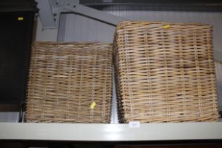 Two wicker log baskets