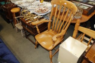 An elm slat back kitchen elbow chair