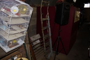 A clothes rail and a wooden and metal step ladder