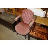 A 19th Century mahogany elbow chair with pink butt