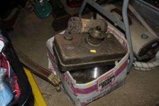 A box containing Vintage glass jars; paraffin heat