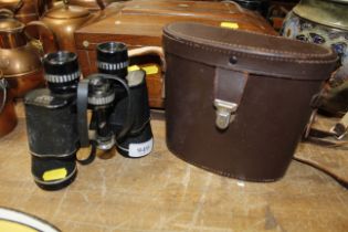 A pair of Wilkinson 8x40 binoculars and case