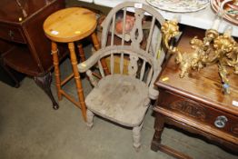 An antique child's miniature Windsor chair
