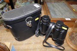 A pair of Hanimex 10x50 binoculars in case