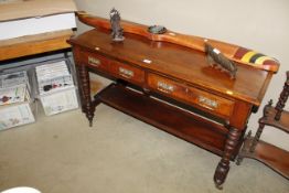 An Edwardian mahogany two drawer side table