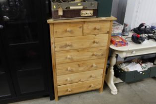 A pine seven drawer chest