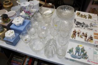 A collection of various table glassware including