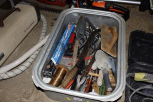 A plastic tray of various tools