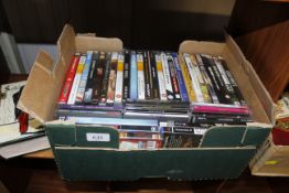 A quantity of DVDs and CDs