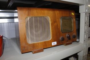 A walnut cased vintage radio