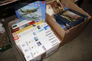 Two boxes of miscellaneous jigsaw puzzles