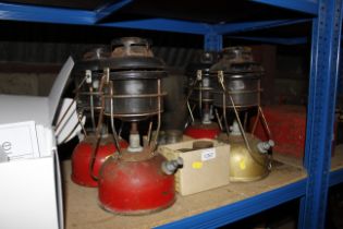 Four Tilley lamps