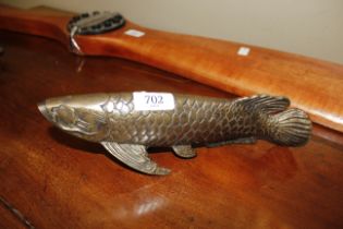 A bronzed figure of a carp