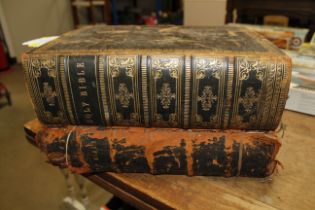 Two antique leather bound Bibles