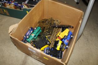 A box of die cast vehicles