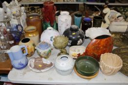 A collection of various pottery vases, stoneware s