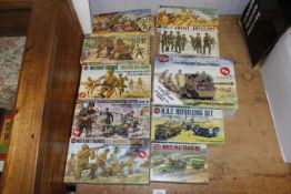 A collection of Air Fix and Revell military model kits in boxes