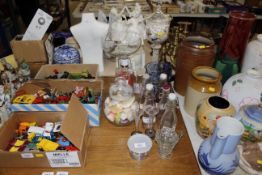 Various decorative glassware including a jar with