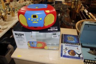 A Bush child's compact disc player and two CD's