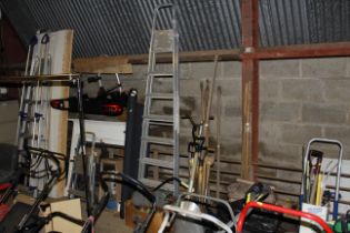 An aluminium step ladder and a box of various tool