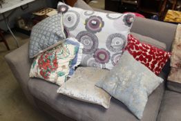 A collection of various scatter cushions