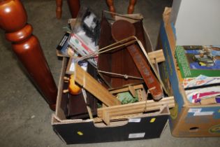 A box of various wooden ware, advertising items et