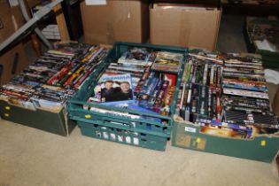 Three boxes of DVDs