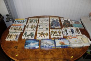 A quantity of Tamiya and other military model kits