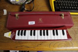 A Hohner melodica piano 27 with case