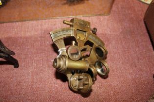 A small brass sextant