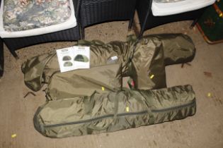 A Trakker Tempest fishing bivvy with extra panels