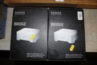 Two Sonos Bridge wireless hi-fi system units