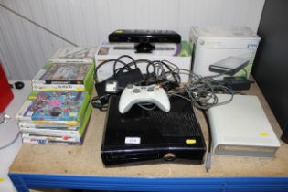 An X-box 360 slim with X-box 360 Blu-ray DVD player