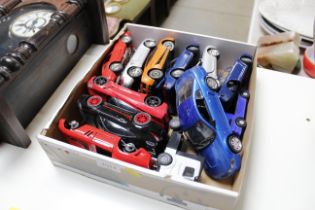 A box of model 1/24 scale model cars