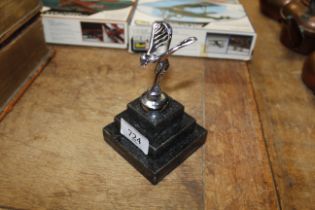 A Spirit of Ecstasy model on granite style base